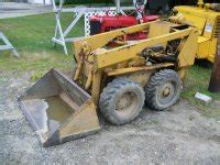 looking at an owatonna onan 2 cyl engine skid steer